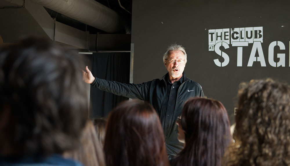 Pictured is Associate SAEM Professor Ed Traversari, M.B.A., at Stage AE. | Photo by Chris Rolinson